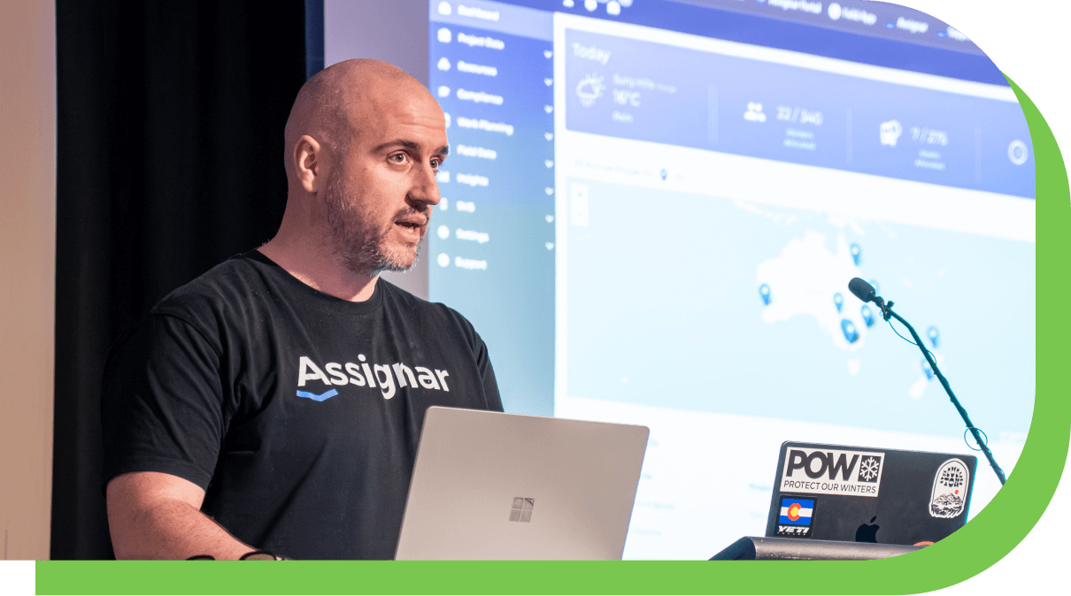 Assignar engineer speaking on stage