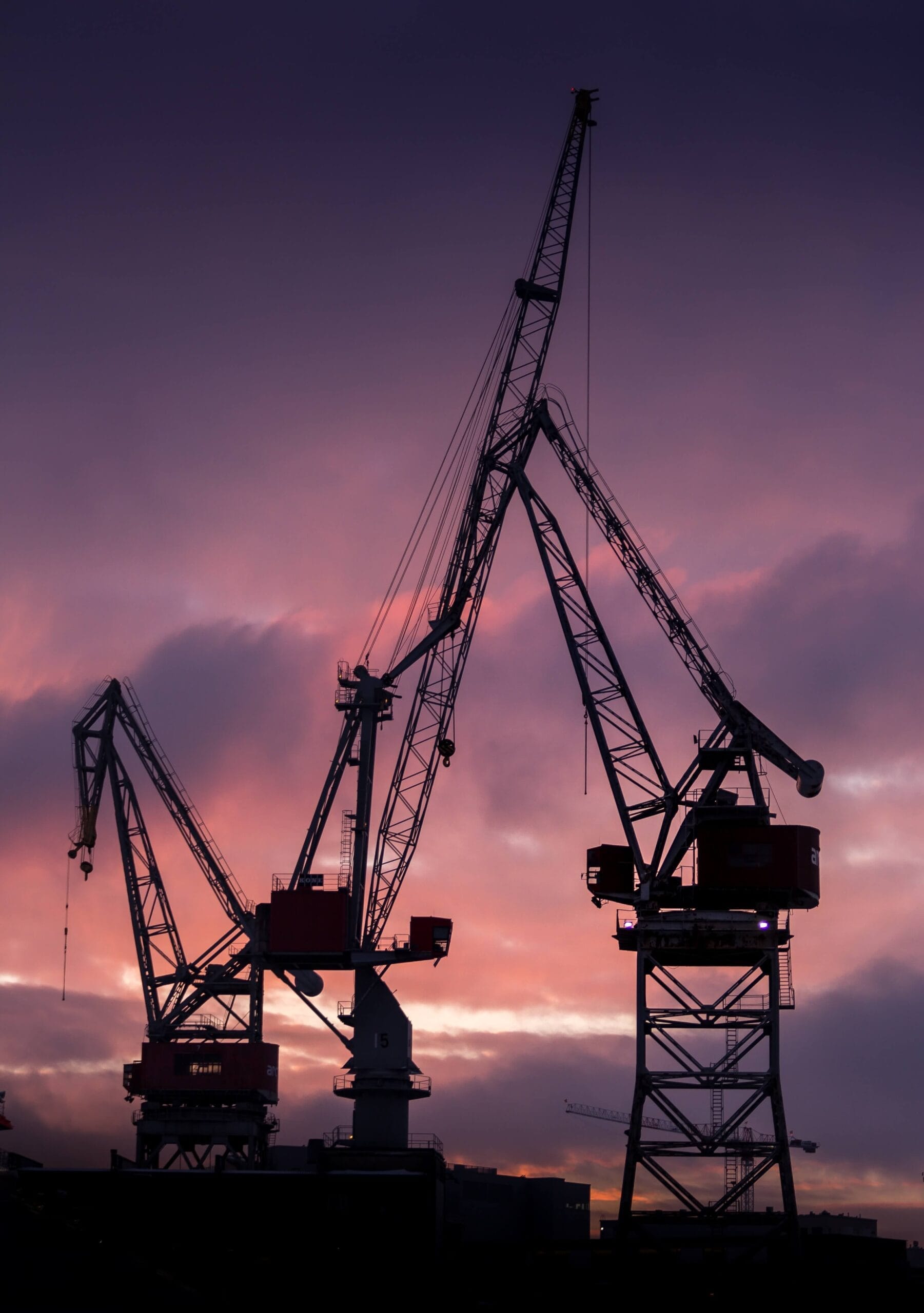 Tower cranes against the sky