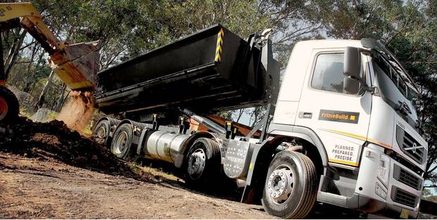Tipper truck being loaded on site